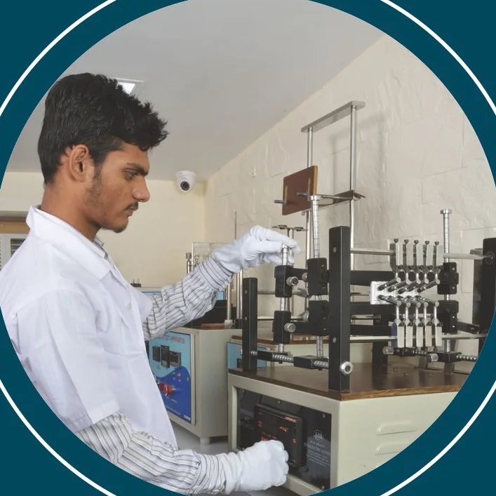 Technician in gloves working at a test rig